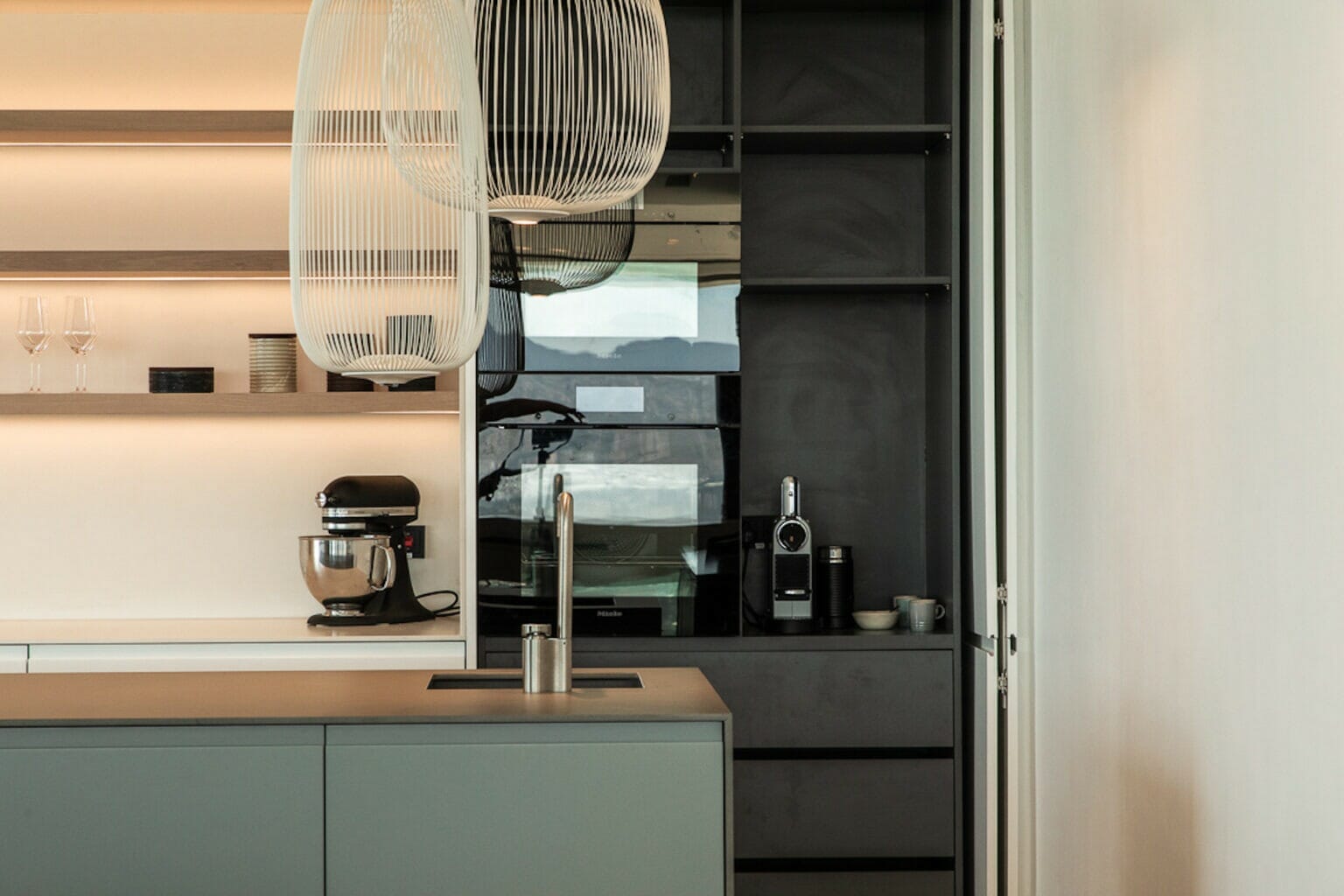 Pocket doors that conceal ovens and small coffee station
