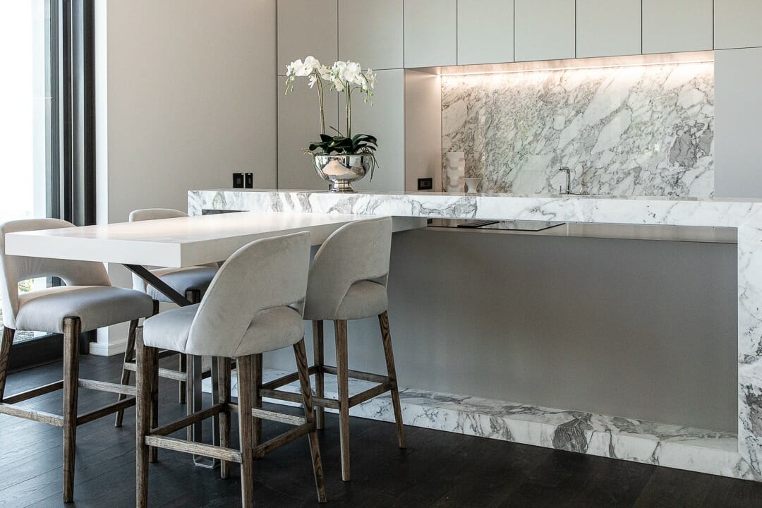 Wunder's barstools surround the snack table that adjoins the Eurocasa HT50 kitchen